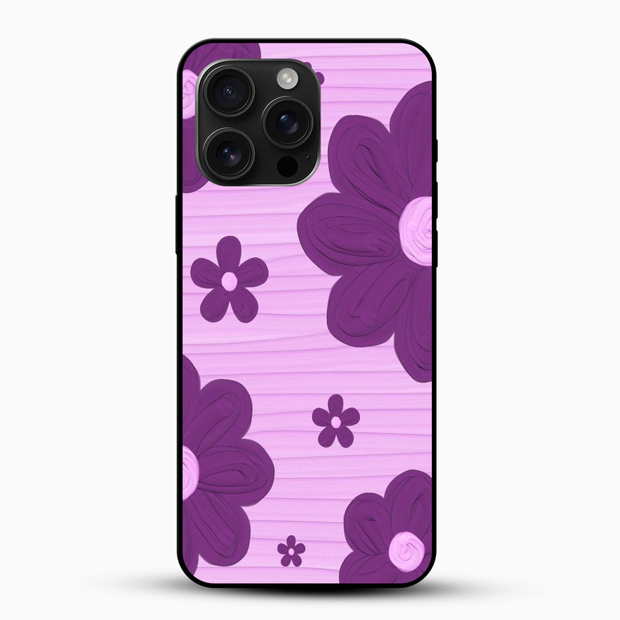 Phone case with purple floral design on a pink background