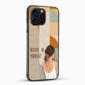 Phone case with a design of a woman looking at herself in a mirror and the text 'Believe in Yourself'.