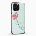 Phone case with a cassette tape design on a light green background