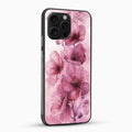 Phone case with pink floral design on a white background
