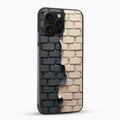 Phone case with black and beige brick pattern on a white background